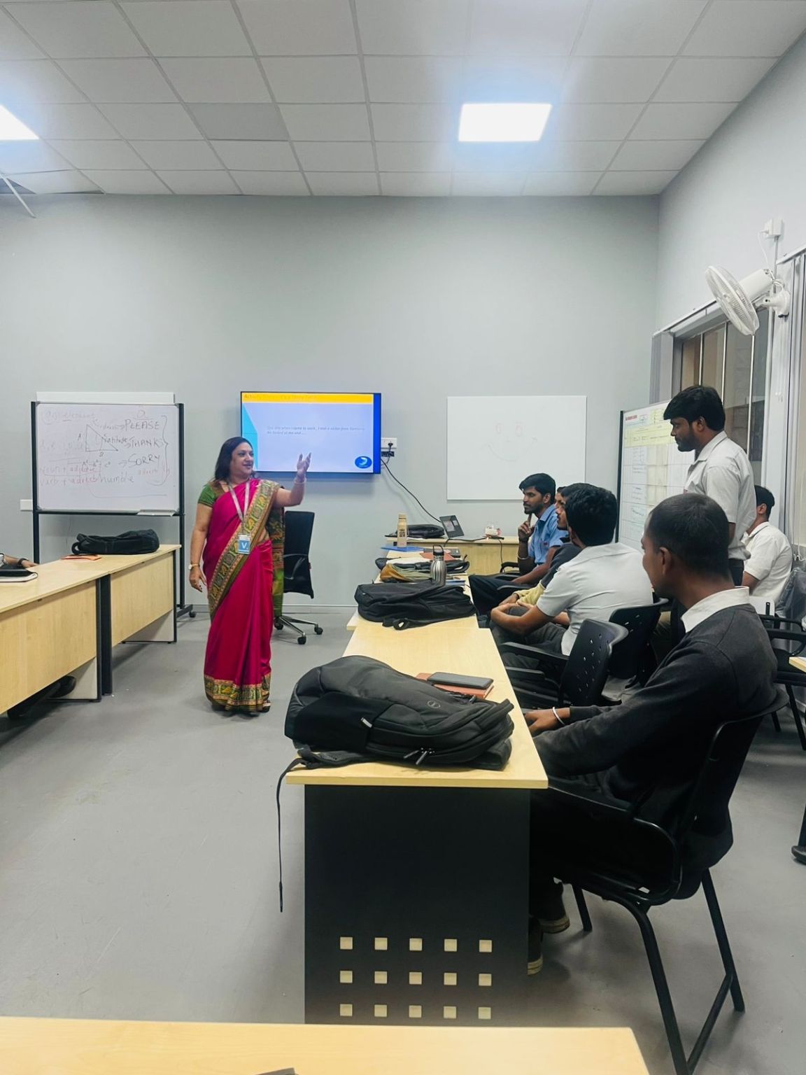 An IZT facilitator teaching a group